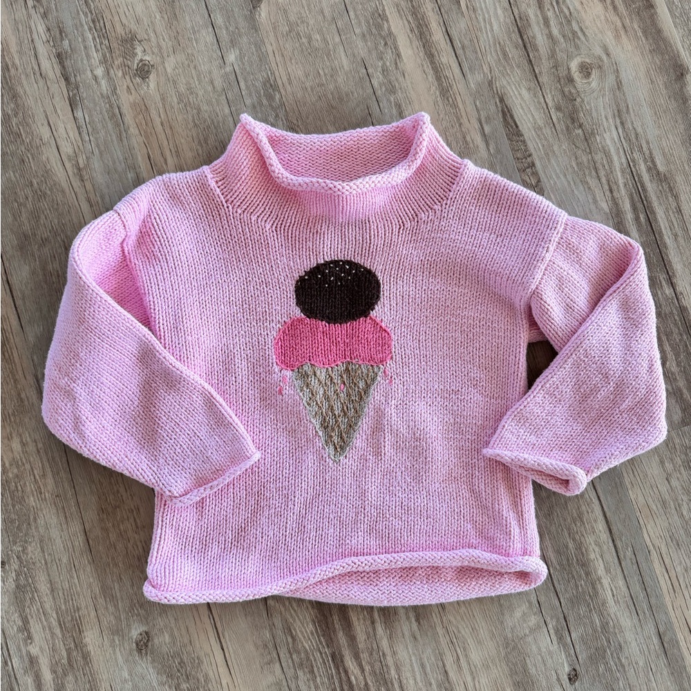 Vintage pink knit sweater with sweet ice cream cone detail, roll neck & sleeves.